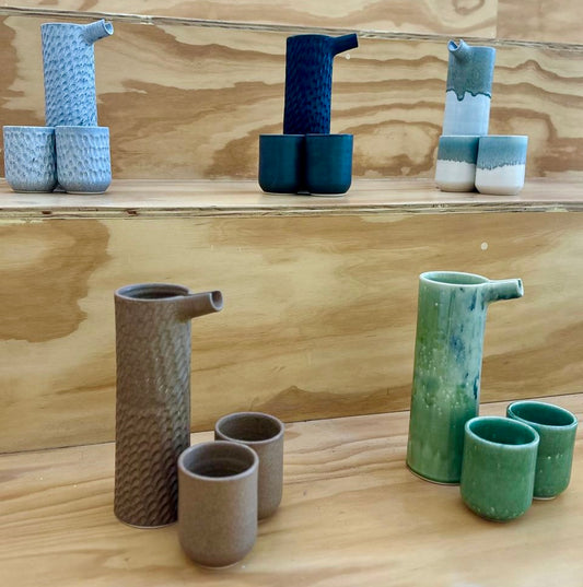 Juego de jarra y dos vasos