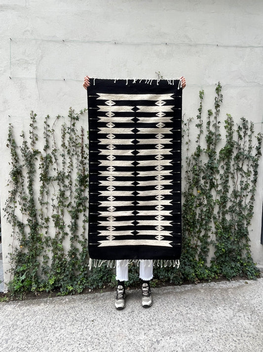 Tapete Huesos blanco y negro